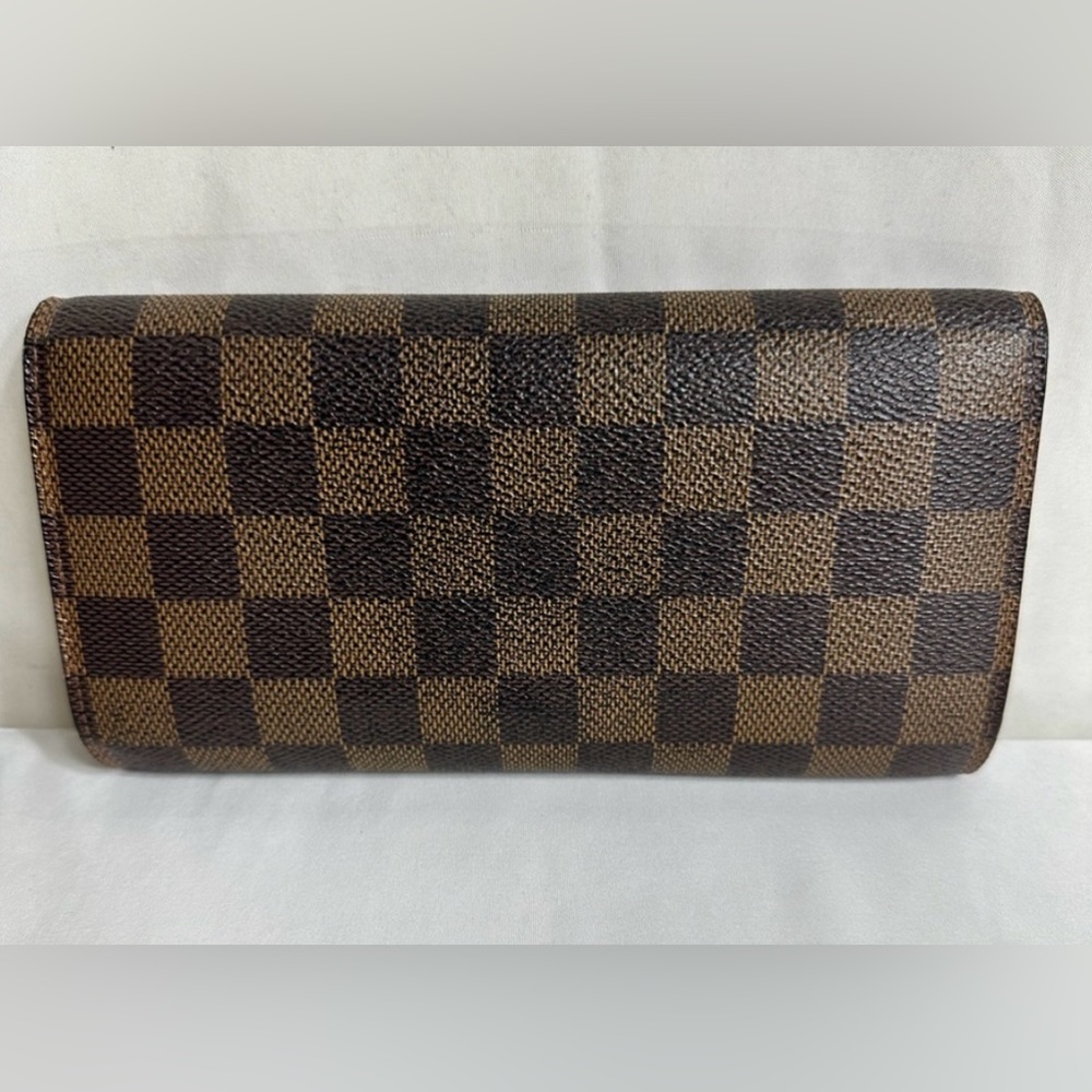 Authentic Louis Vuitton Porteuille International Wallet.
